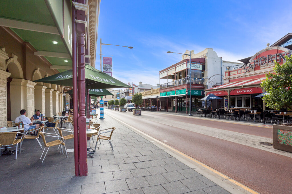 Street view of Fremantle Perth with heritage buildings, cafés, outdoor dining and shops along the popular South Terrace cappuccino strip.