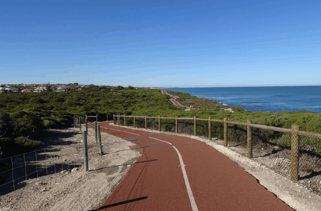 Coastal walking path at Burns Beach leading towards Ocean Reef with Indian Ocean views in Perth Western Australia